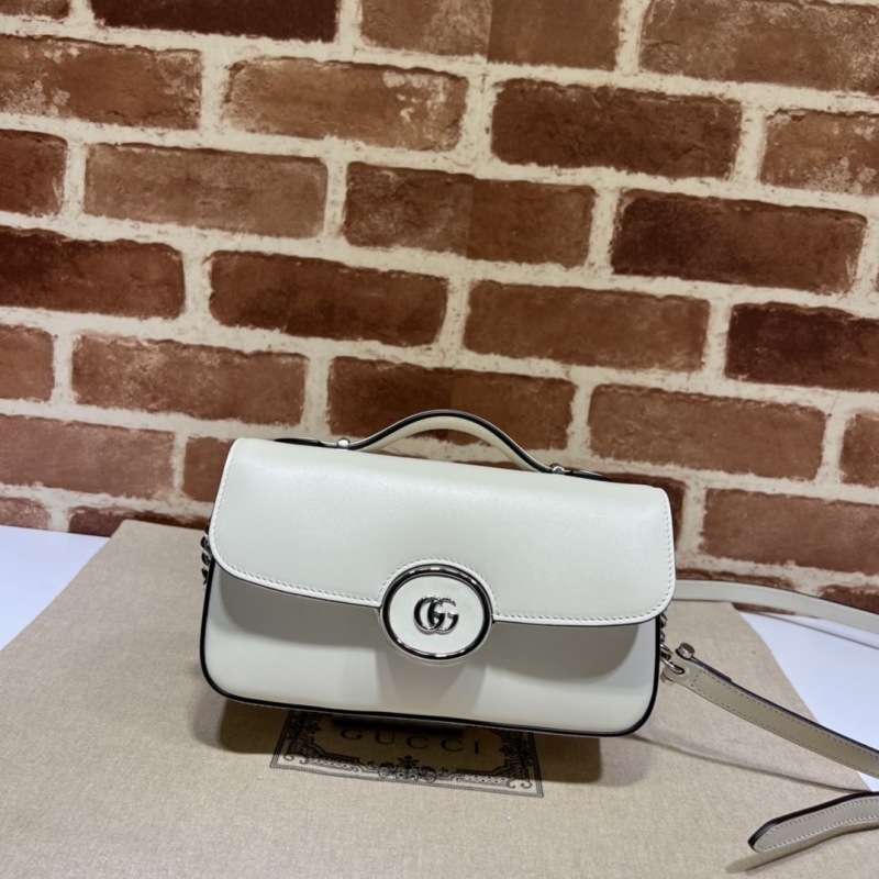 G*u*i top handle bags